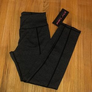 Dark gray workout leggings with mesh
